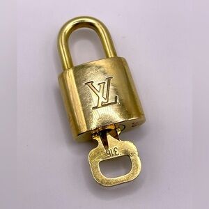 100% Authentic and pre loved Louis Vuitton - Gold Lock and Key set - #316